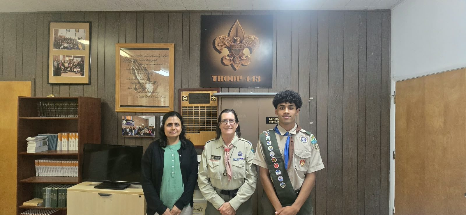 Eagle Scout Pranav with his mother and a Scouting leader
