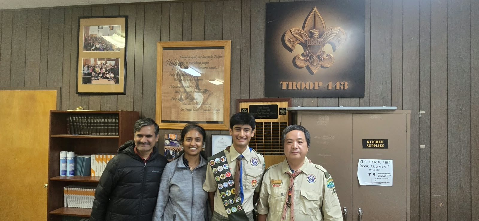 Eagle Scout Vedant with his parents and a Troop 443 leader