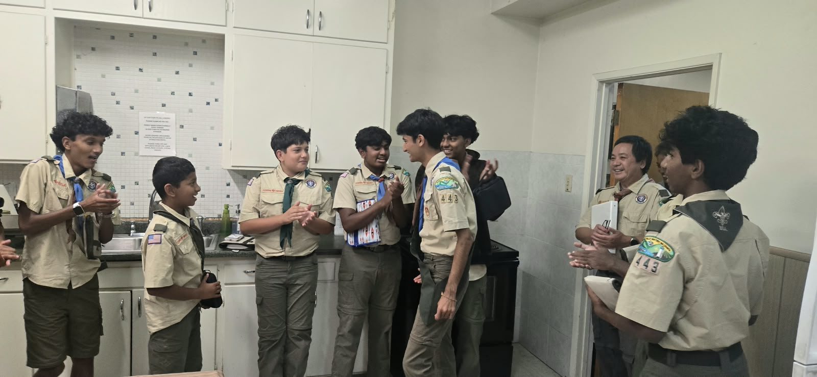 Troop 443 scouts congratulating Vedant