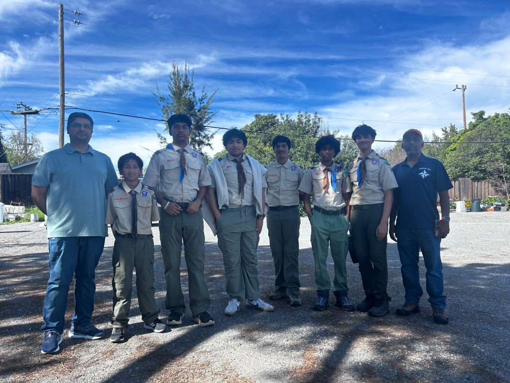 Troop 443 scouts and leaders in uniform outdoors