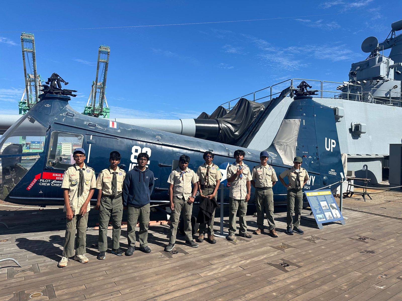 Troop 443 scouts in uniform on the deck of the USS Iowa
